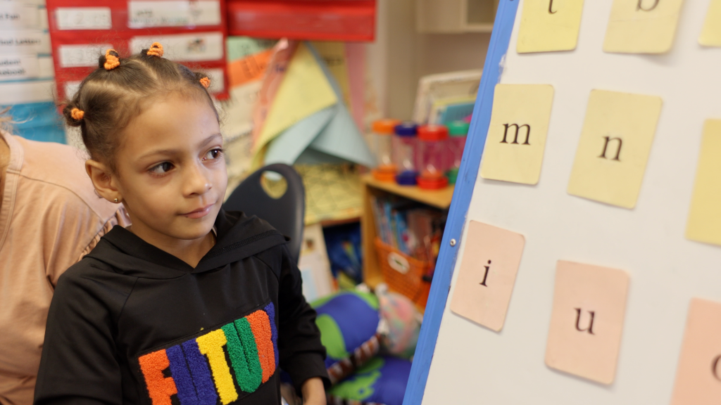 student doing fundations