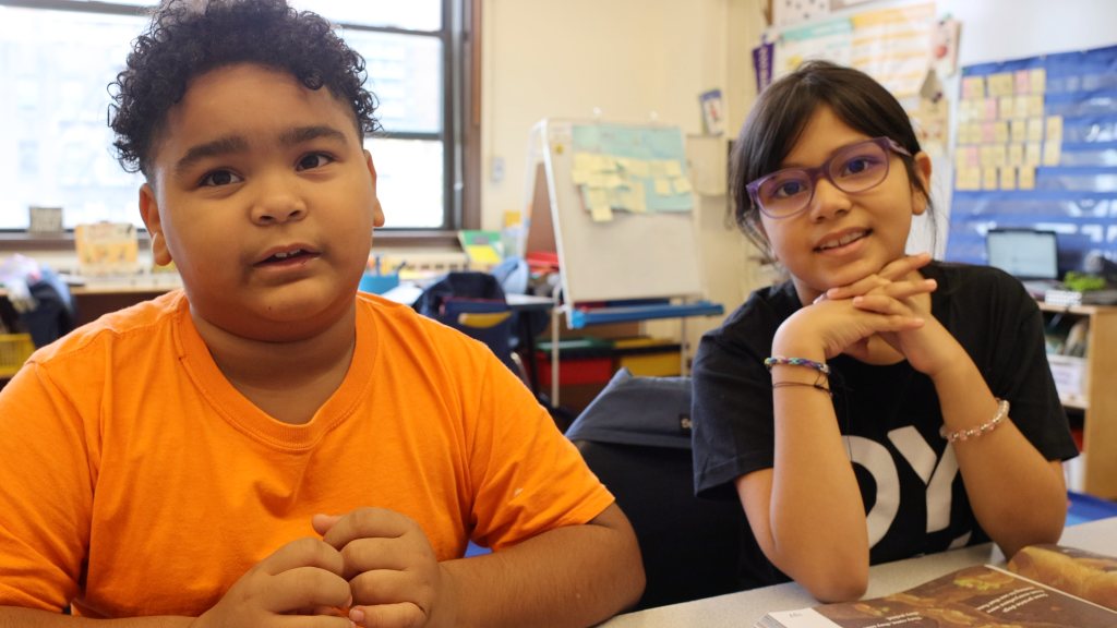students addressing the camera